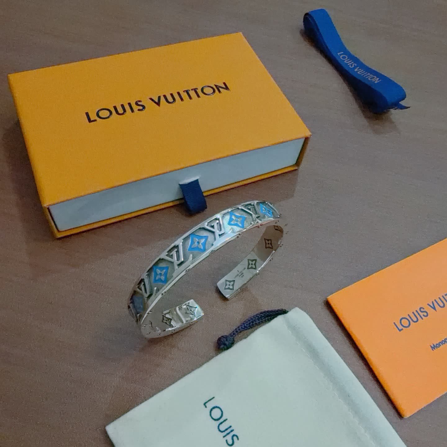 Louis Vuitton Silver Bracelet with Blue and Orange Accents